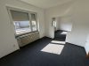 Freistehendes Ein-/ Zweifamilienhaus mit Ausbaureserve zu verkaufen - Wohnzimmer